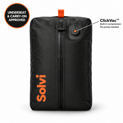 Solvi ClickVac travel compression bag in black with orange pull tab