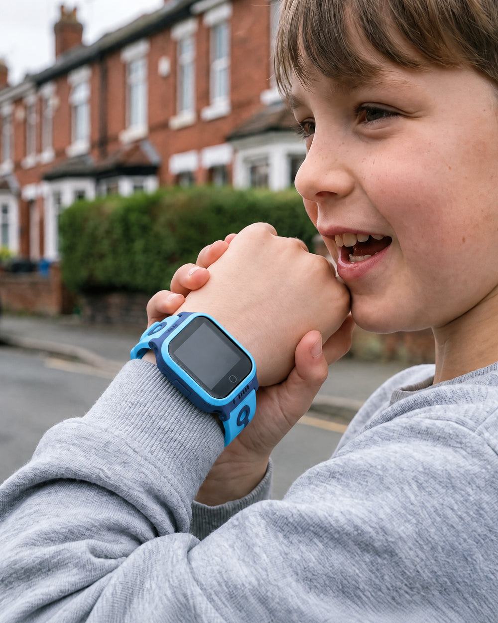 Child smiling at the Solvi Max on their wrist